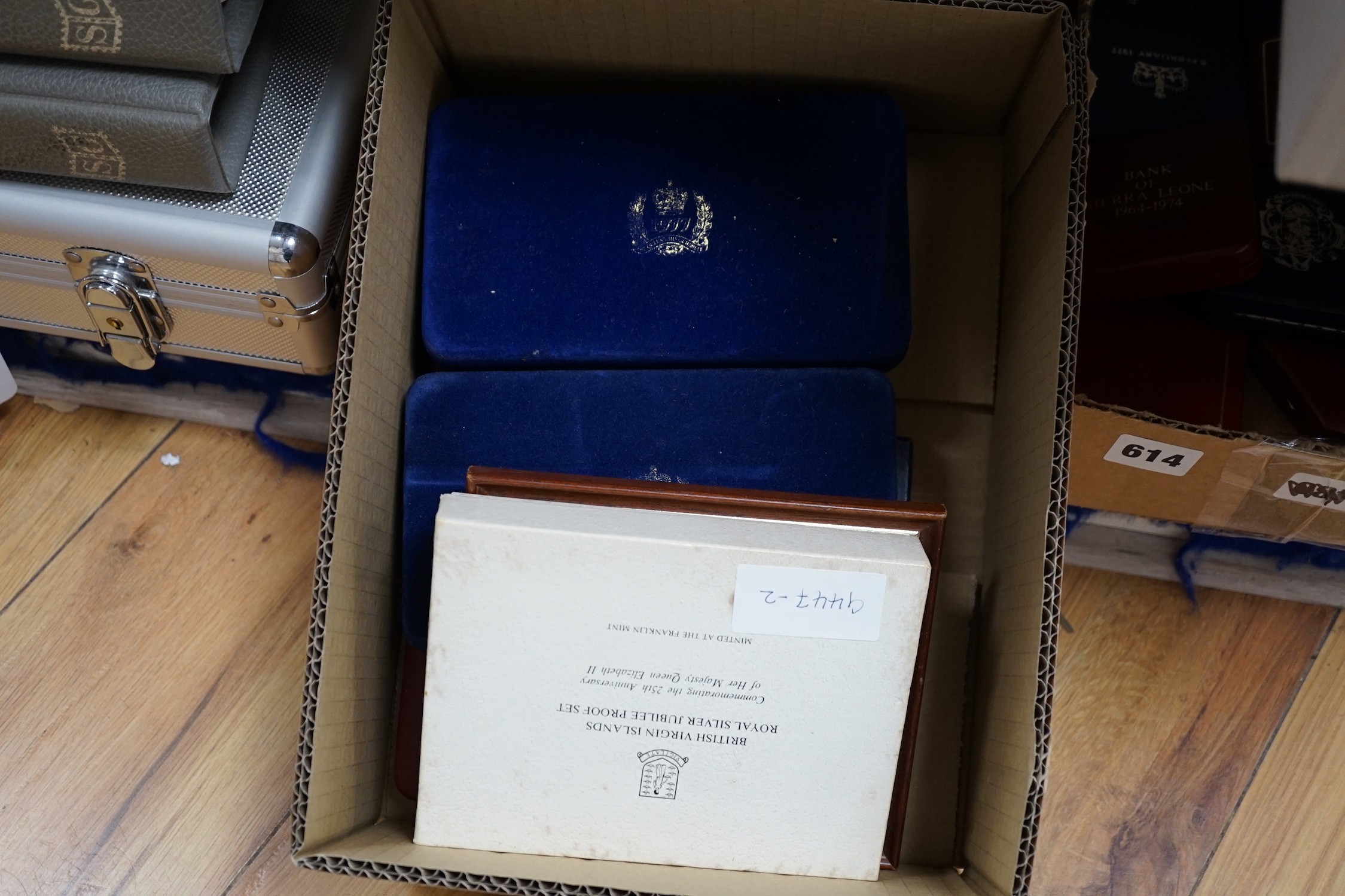 Pobjoy Mint eight silver crown 1977 set, two similar Isle of Man silver proof sets 1977, Franklin Mint British Virgin Islands Jubilee silver proof set, a Danbury silver ingot etc.